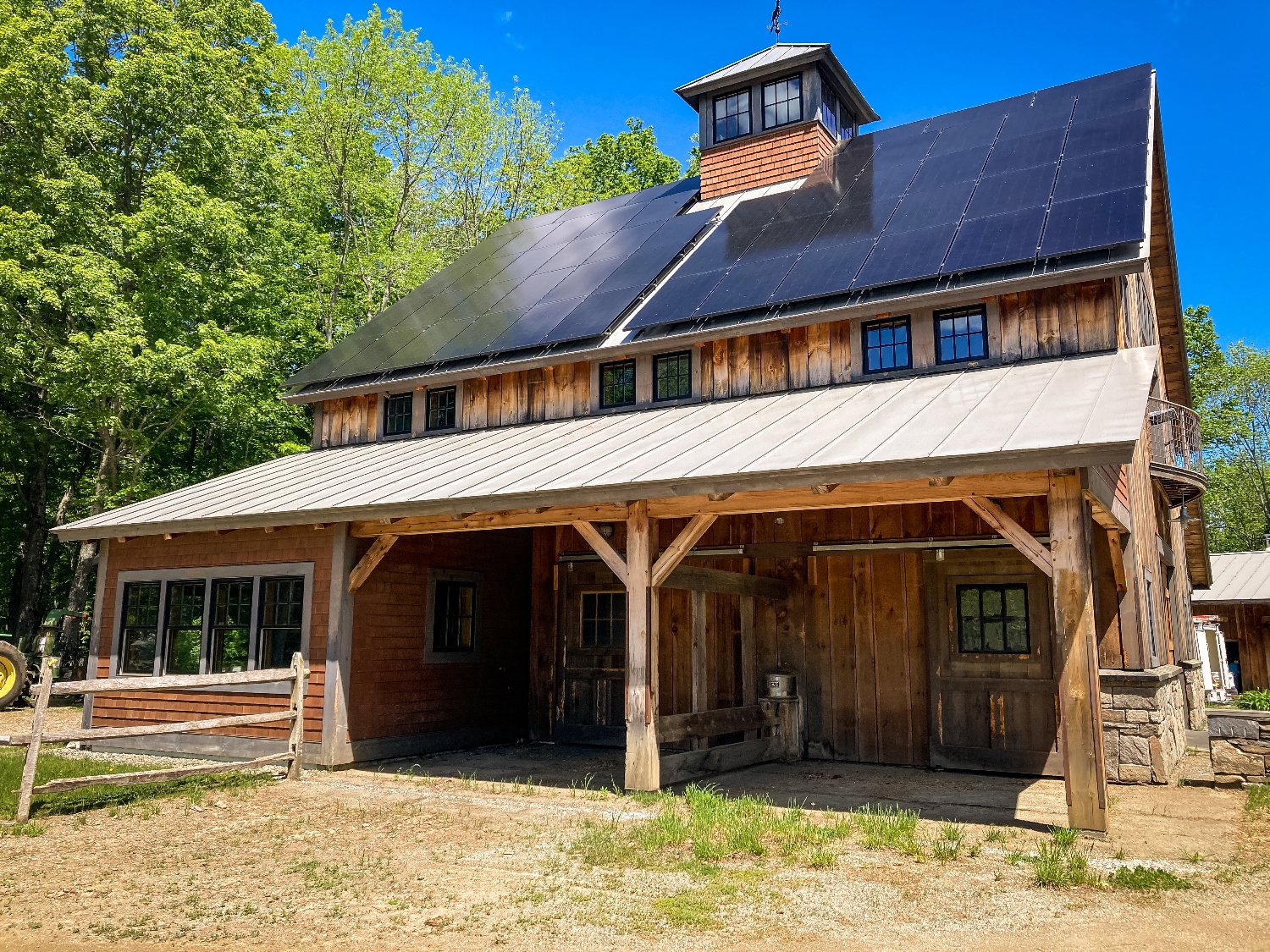 Solar installers building a solar carport in Vermont.